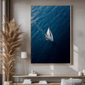 Quadro Decorativo Barco à Vela Serene | quadros decorativos para sala | Veleiro branco em águas azuis profundas capturado de perspectiva aérea | Porao dos Quadros