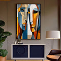 Quadro Decorativo Conexão Geométrica | quadros decorativos para sala | Dois rostos abstratos fragmentados em blocos geométricos de azul, laranja, amarelo e bege em composição contemporânea. | Porao dos Quadros