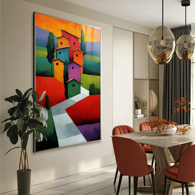 Quadro Decorativo Jornada das Casas Vibrante | quadros decorativos para sala | Casarões coloridos em laranja, rosa e amarelo com paisagem de céu degradê e ciprestes verdes | Porao dos Quadros