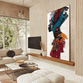 Quadro Decorativo Silhueta Feminina Vibrante | quadros decorativos para sala | Perfil feminino em dupla exposição com arquitetura urbana em tons azul, vermelho e laranja. | Porao dos Quadros