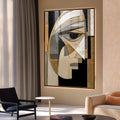 Quadro Decorativo Minimalista Olhar Enigmático | quadros decorativos para sala | Rosto abstrato geométrico em preto, branco e dourado com olho em destaque. | Porao dos Quadros