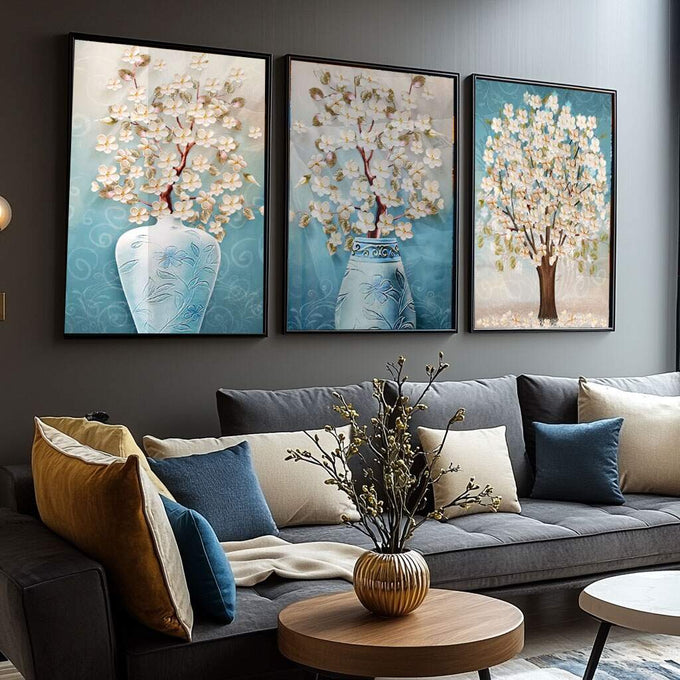 Quadro Decorativo Serenidade Azul Pastel: Flores e Árvores | quadros decorativos para sala | Triptco com árvore florida e pétalas brancas em tons azul, creme e branco com movimento e delicadeza. | Porao dos Quadros