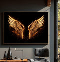 Quadro Decorativo Asas Douradas Elegantes | quadros decorativos para sala | Asas douradas incandescentes em chamas com efeito luminoso sobre fundo preto absoluto | Porao dos Quadros