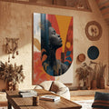 Quadro Decorativo Abstrato Serenidade e Força | quadros decorativos para sala | Perfil feminino em preto envolvido por formas geométricas em vermelho, laranja e azul | Porao dos Quadros