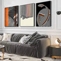 Quadro Decorativo Elegância Moderna: Listras Monocromáticas | quadros decorativos para sala | Composição abstrata com linhas dinâmicas em preto, branco e laranja vibrante formando ondas. | Porao dos Quadros