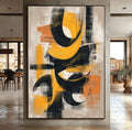 Quadro Decorativo Abstrato Energizante | quadros decorativos para sala | Composição abstrata com círculos e formas geométricas em amarelo, preto e branco com textura dinâmica | Porao dos Quadros