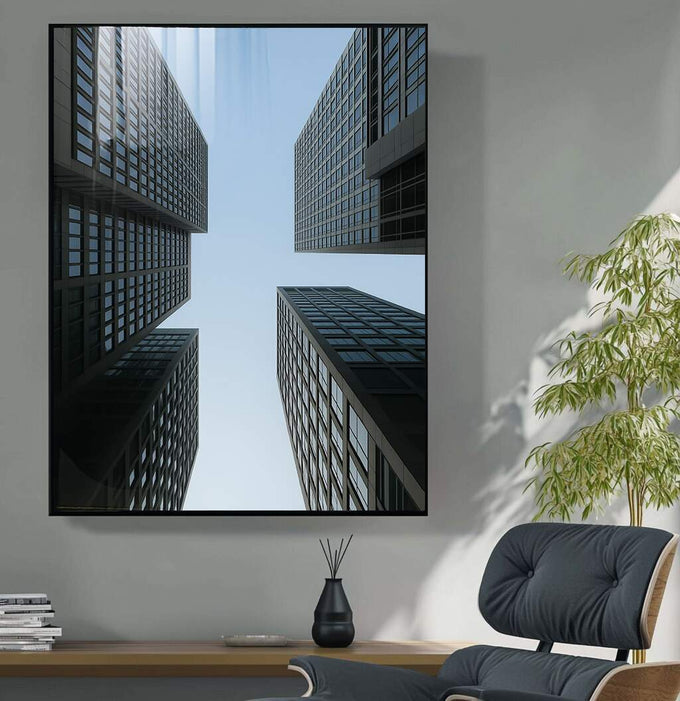 Quadro Decorativo Visões de Arranha-Céus | quadros decorativos para sala | Perspectiva de edifícios urbanos em vidro e concreto convergindo para céu azul claro | Porao dos Quadros