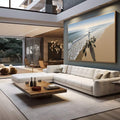 Quadro Decorativo Jesus Harmonia à Beira do Mar | quadros decorativos para sala | Surfista caminhando na praia ao entardecer com sombra alongada e ondas ao fundo | em Quadros para Sala | Porao dos Quadros