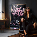 Cerejeira bonsai com flores rosa sobre rochas escuras e fundo preto, quadro decorativo