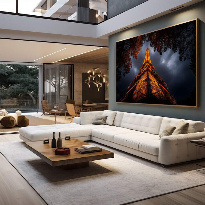 Quadro Decorativo Torre Eiffel Noturna Elegante | quadros decorativos para sala | Torre Eiffel dourada iluminada à noite com árvores em silhueta e céu azul tempestuoso | em Quadros para Sala | Porao dos Quadros