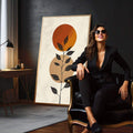 Quadro Decorativo Serenidade Botânica Minimalista | quadros decorativos para sala | Flor abstrata em tons de laranja e bege com folhas escuras em caule minimalista | em Quadros para Sala | Porao dos Quadros
