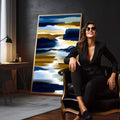 Quadro Decorativo Abstrato Serenidade em Cores | quadros decorativos para sala | Pinceladas abstratas em azul profundo, dourado e branco em composição dinâmica vertical | em Quadros para Sala | Porao dos Quadros