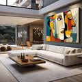 Quadro Decorativo Abstrato do Diálogo Silencioso | quadros decorativos para sala | Composição abstrata com múltiplos rostos cubistas em laranja, azul e preto entrelaçados. | em Quadros para Sala | Porao dos Quadros