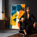 Quadro Decorativo Conexão Vibrante | quadros decorativos para sala | Três rostos abstratos sobrepostos em azul, laranja, amarelo e branco em composição geométrica moderna | em Quadros para Sala | Porao dos Quadros