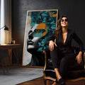 Harmonia Abstrata: Quadro Feminino Elegante | quadros decorativos para sala | Rosto em preto e branco com padrões geométricos azuis e laranja em composição moderna. | em Quadros para Sala | Porao dos Quadros