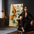 Quadro Decorativo Pássaro Vibrante Minimalista | quadros decorativos para sala | Beija-flor em voo com asas douradas e azuis entre flores brancas, laranjas e bege em relevo tátil. | em Quadros para Sala | Porao dos Quadros