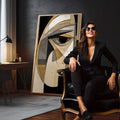 Quadro Decorativo Minimalista Olhar Enigmático | quadros decorativos para sala | Rosto abstrato geométrico em preto, branco e dourado com olho em destaque. | em Quadros para Sala | Porao dos Quadros