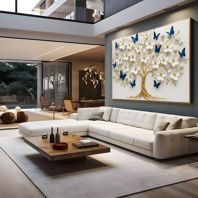 Árvore da vida com tronco dourado, flores brancas em relevo e borboletas azuis, quadro decorativo