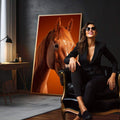 Quadro Decorativo Cavalo em Cores Vibrantes | quadros decorativos para sala | Cavalo marrom em retrato fotográfico com fundo laranja intenso e olhar direto | em Quadros para Sala | Porao dos Quadros