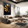 Quadro Decorativo Folha de Monstera Dourada | quadros decorativos | Folha monstera em dourado luminoso com recortes característicos sobre fundo azul profundo. | em Quadros para Escritorio | Porao dos Quadros