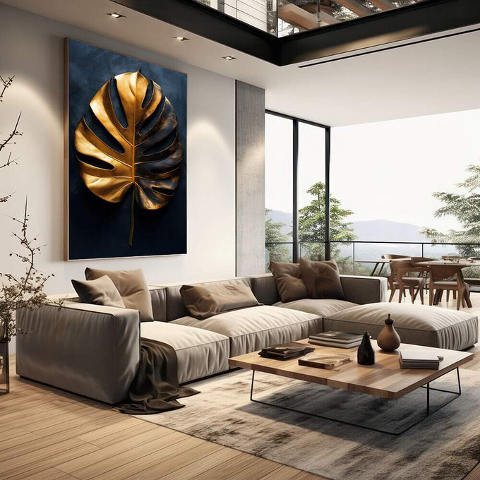 Quadro Decorativo Folha de Monstera Dourada | quadros decorativos | Folha monstera em dourado luminoso com recortes característicos sobre fundo azul profundo. | em Quadros para Escritorio | Porao dos Quadros