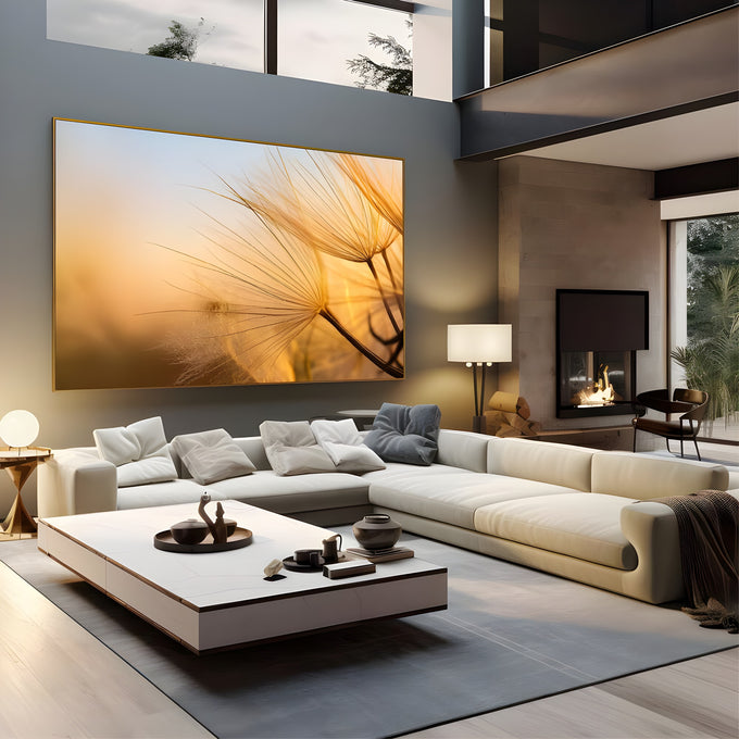 Sementes de dente-de-leão em close com luz dourada do pôr do sol ao fundo, quadro decorativo