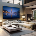 Quadro Decorativo Torre Eiffel Noturna | quadros decorativos | Torre Eiffel iluminada à noite refletida em água azul escuro ao entardecer. | em Quadros para Escritorio | Porao dos Quadros
