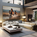 Três cavalos marrons galopando na água em campo dourado com montanhas ao fundo, quadro decorativo