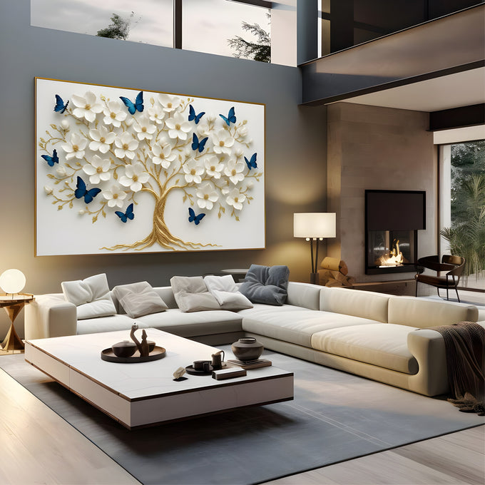 Árvore da vida com tronco dourado, flores brancas em relevo e borboletas azuis, quadro decorativo