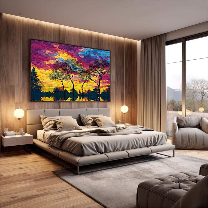 Quadro Decorativo Pôr do Sol Encantado | quadros decorativos premium | Pôr do sol com árvores silhuetadas em rosa, magenta, amarelo e azul vibrantes | em ambiente 4 | Porao dos Quadros