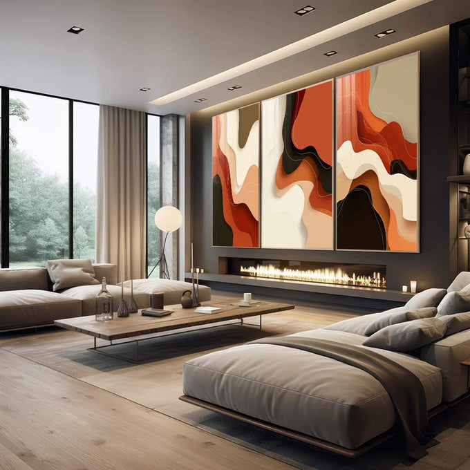 Quadro Decorativo Tríptico Orgânico | quadros decorativos premium | Triptíco com formas abstratas ondulantes em laranja, preto e branco, criando movimento visual dinâmico | em ambiente 4 | Porao dos Quadros