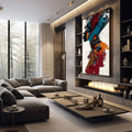 Quadro Decorativo Silhueta Feminina Vibrante | quadros decorativos premium | Perfil feminino em dupla exposição com arquitetura urbana em tons azul, vermelho e laranja. | em ambiente 4 | Porao dos Quadros