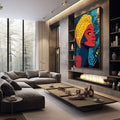 Quadro Decorativo Empoderamento Feminino em Cores Vibrantes | quadros decorativos premium | Mulher africana com turbante laranja, rosto vermelho, folhas azuis e douradas ao fundo. | em ambiente 4 | Porao dos Quadros