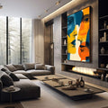 Quadro Decorativo Conexão Vibrante | quadros decorativos premium | Três rostos abstratos sobrepostos em azul, laranja, amarelo e branco em composição geométrica moderna | em ambiente 4 | Porao dos Quadros