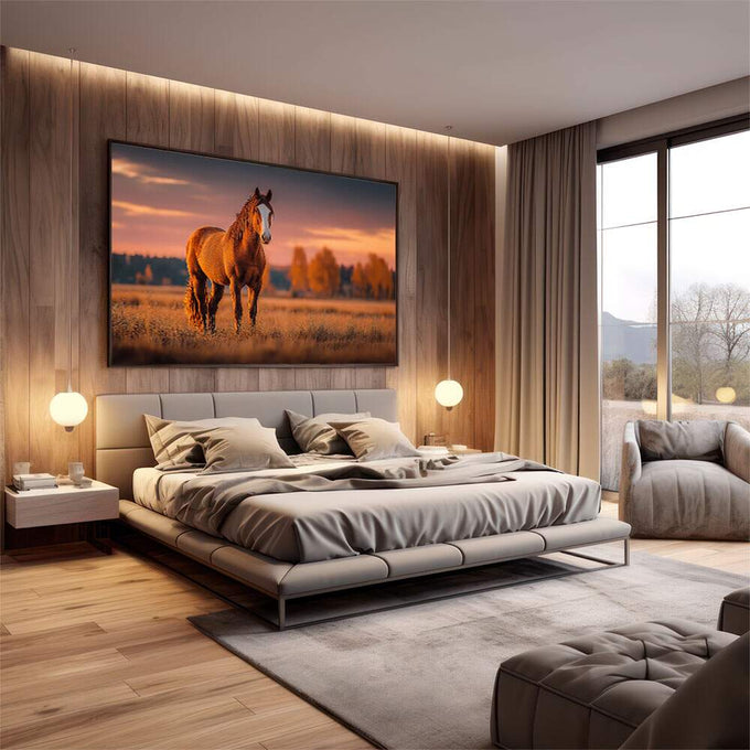 Quadro Decorativo Cavalo em Campo Sereno | quadros decorativos premium | Cavalo dourado em pé em campo aberto ao pôr do sol com céu coral e laranja queimado ao fundo. | em ambiente 4 | Porao dos Quadros
