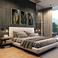Quadro Decorativo: Luxo de Folhas Tropicais Douradas | quadros decorativos premium | Três painéis com folhas tropicais em dourado luminoso sobre fundo preto profundo com detalhes precisos. | em ambiente 4 | Porao dos Quadros