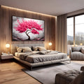 Árvore cerejeira com copa rosa florida e tronco retorcido sobre fundo cinza texturizado, quadro decorativo
