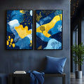 Paisagem abstrata azul marinho e amarela com corais, árvores e pontos em duas telas, quadro decorativo