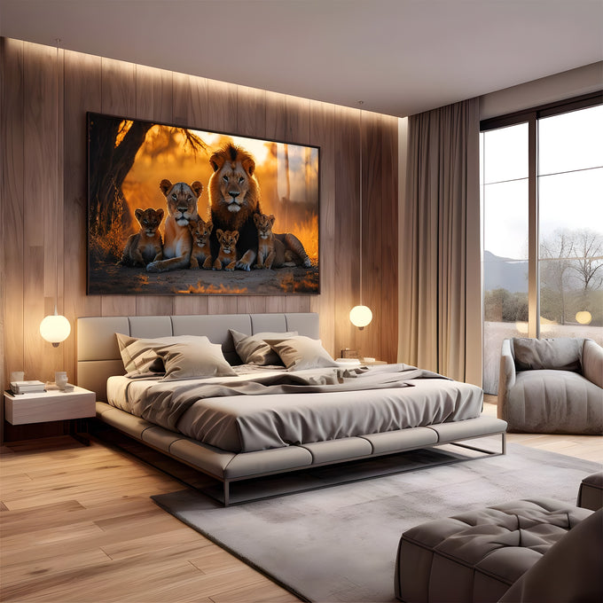 Leão, leoa e quatro filhotes sentados na savana sob luz dourada do pôr do sol, quadro decorativo
