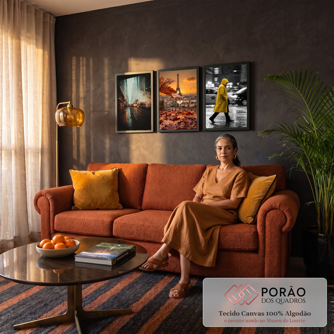 Quadro Decorativo Grande Cena Urbana para Sala Laranja | quadros decorativos para sala de estar | trio de fotos urbanas com trem noturno, folha com gotas e torre eiffel, e pessoa de capa amarela na chuva | em ambiente 3 | Porao dos Quadros