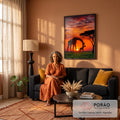 Girafa e filhote em silhueta sob pôr do sol laranja na savana com acácia, quadro decorativo