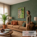 Quadro Decorativo Grande Coruja de Olhos para Sala Verde | quadros decorativos para sala de estar | coruja com olhos laranja intensos entre galhos verdes de pinheiro | em ambiente 3 | Porao dos Quadros