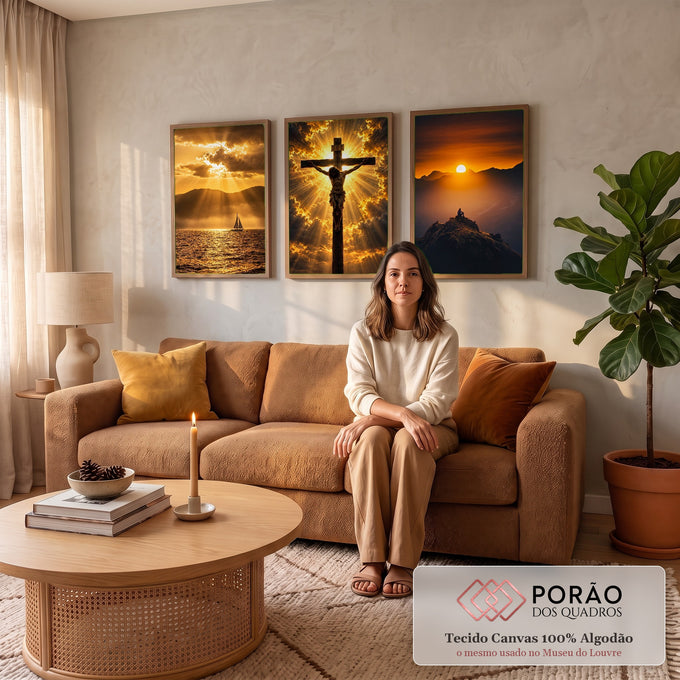 Quadro Decorativo Kit 3 Telas Cristo na Cruz para Sala | quadros decorativos para sala de estar | tríptico com Cristo crucificado ao centro, veleiro e pessoa no cume ao pôr do sol | em ambiente 3 | Porao dos Quadros