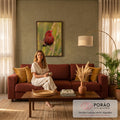 Pássaro vermelho com pintas brancas pousado em haste de capim sobre fundo verde desfocado, quadro decorativo