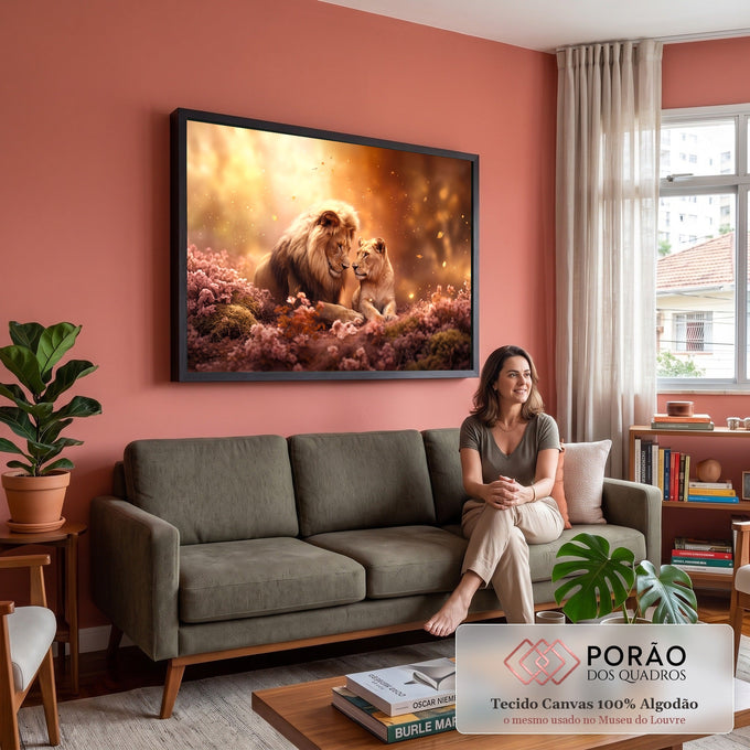 Quadro Decorativo Grande Casal de Leões para Sala Laranja | quadros decorativos para sala de estar | leão e leoa se encarando entre flores rosa e luzes douradas flutuantes | em ambiente 3 | Porao dos Quadros