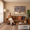 Quadro Decorativo Grande Mulher Lendo Verde para Sala | quadros decorativos para sala de estar | mulher loira sentada lendo livro diante de estante colorida de livros | em ambiente 3 | Porao dos Quadros