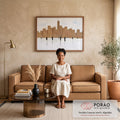 Pintura de prédios em tons bege com silhuetas de pessoas e reflexos sobre fundo branco, quadro decorativo