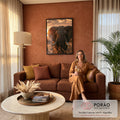 Quadro Decorativo Elefante Africano ao Pôr do Sol Dourado | quadros decorativos para sala de estar | elefante africano de frente com presas em close, luz dourada do pôr do sol ao fundo | em ambiente 3 | Porao dos Quadros