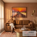 Píer de madeira com quiosque sobre lago calmo sob céu laranja de pôr do sol, quadro decorativo