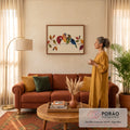 Pássaros feitos de folhas de outono vermelhas, laranjas, verdes e azuis num galho, quadro decorativo